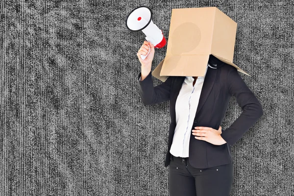 Samengestelde afbeelding van anonieme zakenvrouw houden een megafoon — Stockfoto