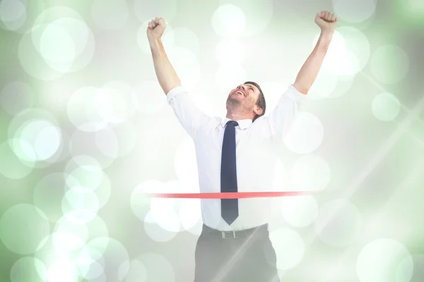 Businessman celebrating success with arms up — Stock Photo, Image