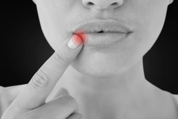 Composite image of woman pointing her lips — Stock Photo, Image