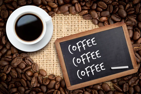 Zusammengesetzte Bild der weißen Tasse Kaffee — Stockfoto