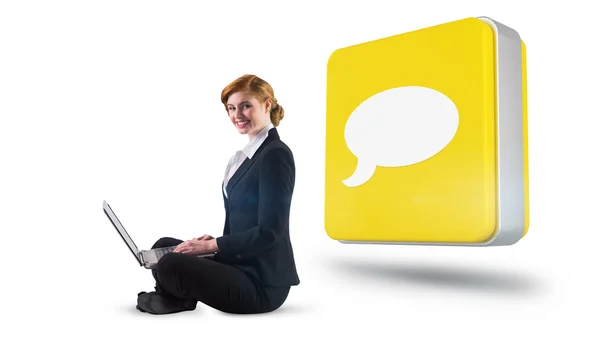 Redhead businesswoman using laptop — Stock Photo, Image