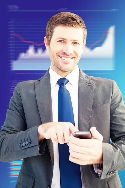 Businessman sending a text message — Stock Photo, Image