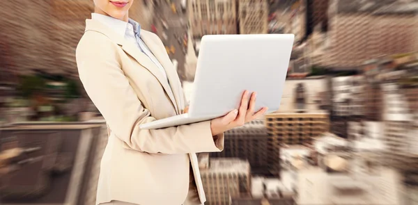 Businesswoman with laptop — Stock Photo, Image