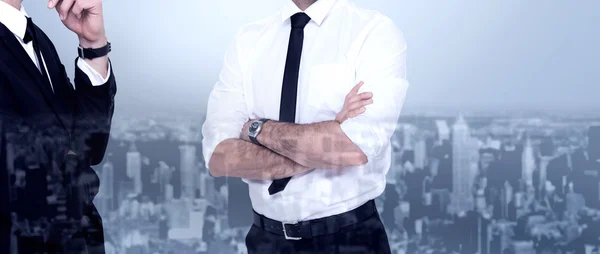 Smiling businessman with arms crossed — Stock Photo, Image