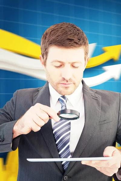 Businessman looking at tablet — Stock Photo, Image