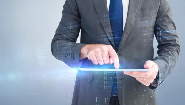 Businessman using his tablet pc — Stock Photo, Image