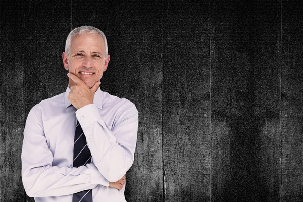 Composite image of businessman thinking — Stock Photo, Image