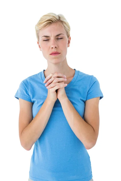 Pěkné blond žena se modlí — Stock fotografie