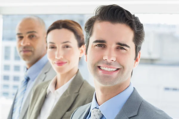 Business colleagues smiling at camera — Stock Photo, Image