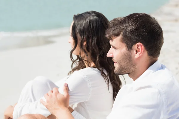 Couple smiling at beach — Stock Photo, Image