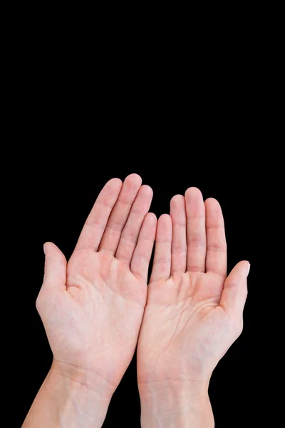 Hands presenting on black background — Stock Fotó