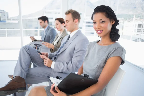 Business people sitting and waiting — Stock Photo, Image