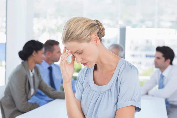 Disappointed businesswoman and her team — Stockfoto