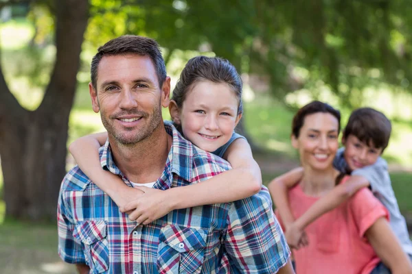 Family in the park together — Stock Photo, Image