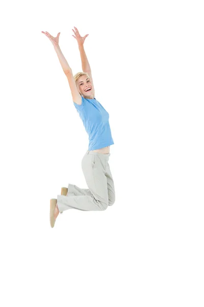 Alegre loira mulher pulando — Fotografia de Stock