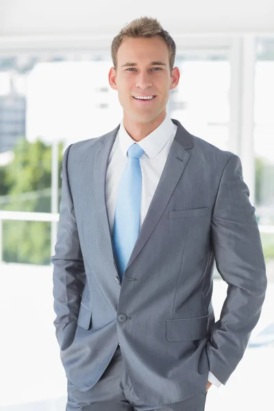 Businessman smiling at the camera — Stock Photo, Image
