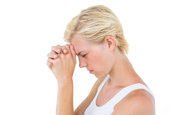 Pretty blonde woman praying — Stock Photo, Image