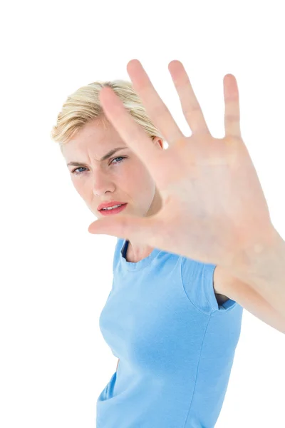 Mujer de popa haciendo gestos con su mano — Foto de Stock