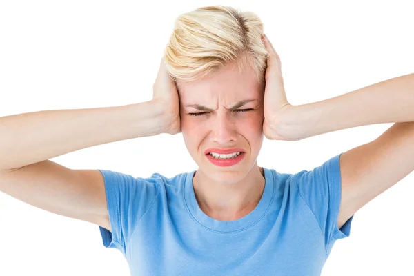 Furious blonde woman holding her head — Stock Photo, Image