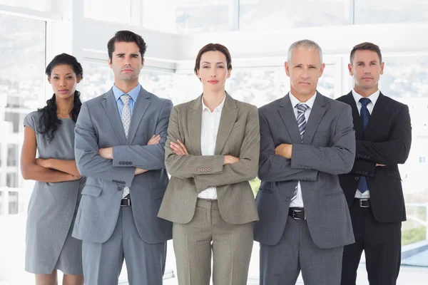 Business colleagues standing in a row — Stock Photo, Image