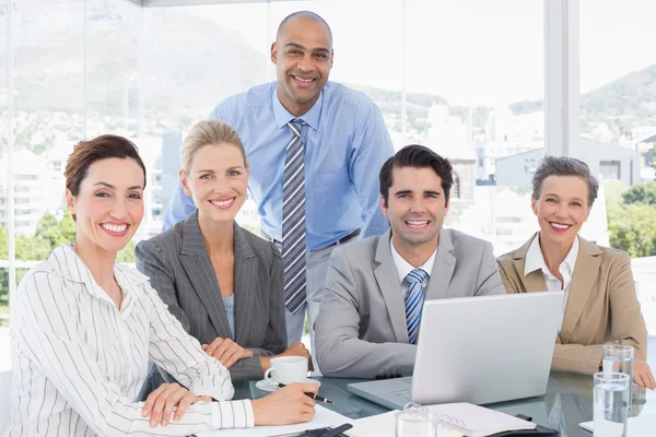 Business team working together on laptop — Stock Photo, Image