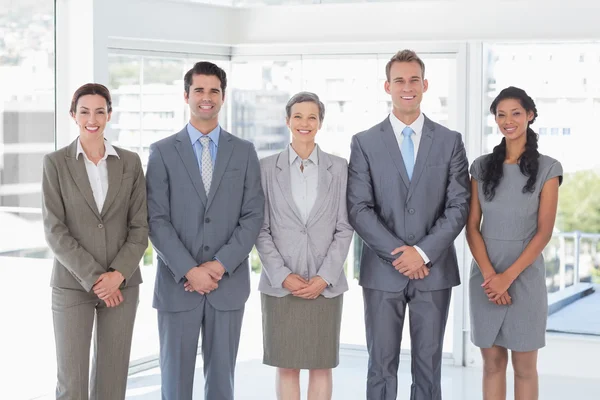 Business people standing in a row — Stock Photo, Image