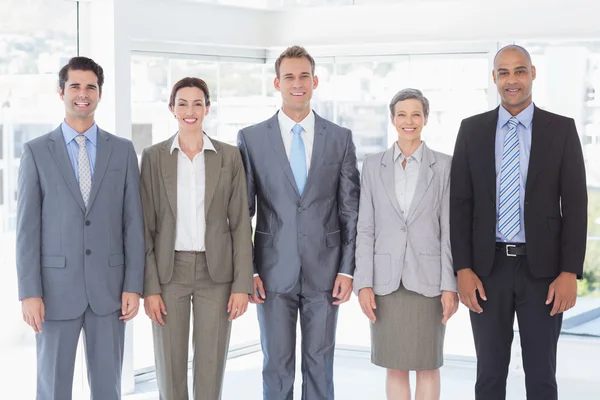 Business people standing in a row — Stock Photo, Image