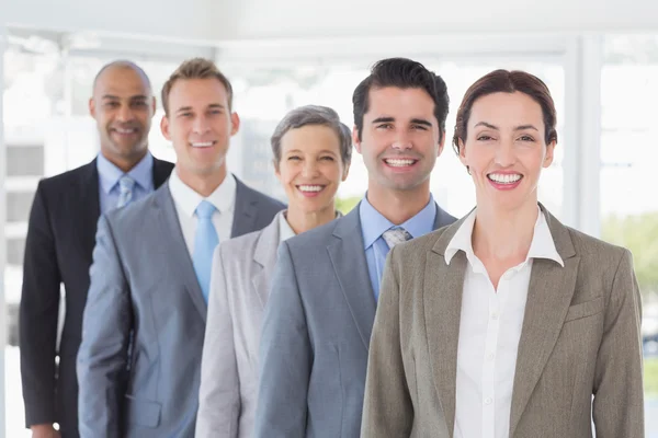 Business people standing in a row — Stock Photo, Image