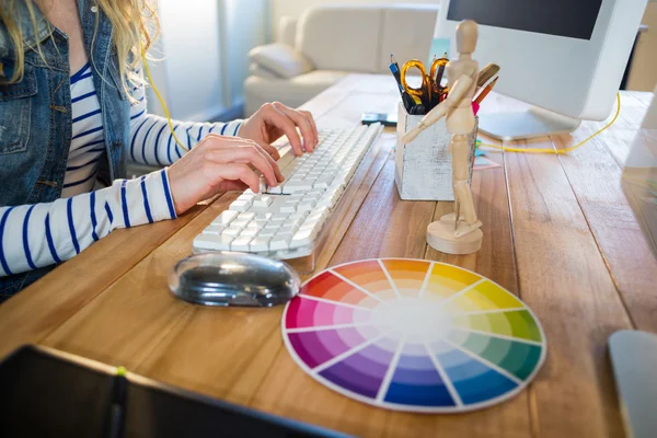 Designer typing on keyboard — Stock fotografie