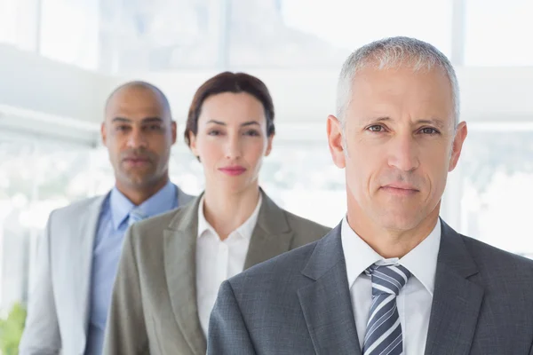 Compañeros de negocios mirando la cámara — Foto de Stock