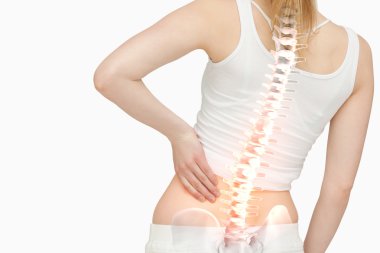 Highlighted spine of woman with back pain clipart