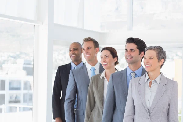 Business people standing in a row — Stock Photo, Image