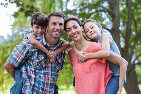 Family in the park together — Stock Photo, Image