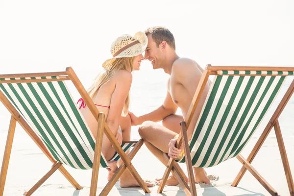 Couple relaxing at the beach — Stock Photo, Image