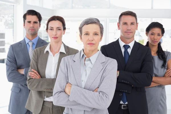 Business colleagues standing in a row — Stock Photo, Image