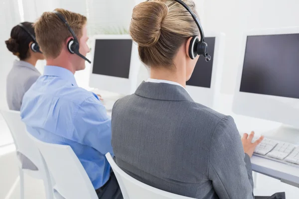 Business team working on computers — Stock Photo, Image