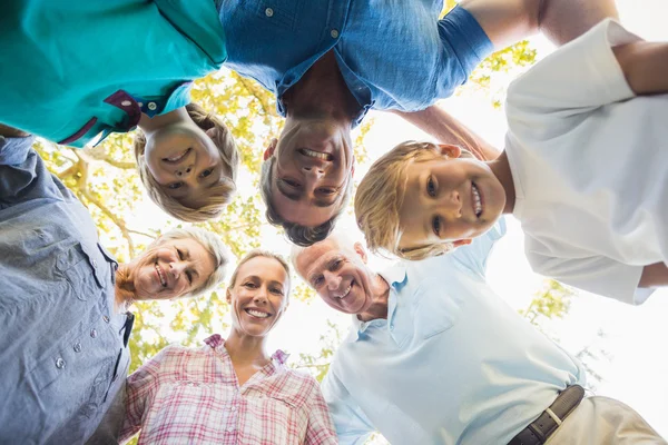 Family looking down camera — Stock Photo, Image