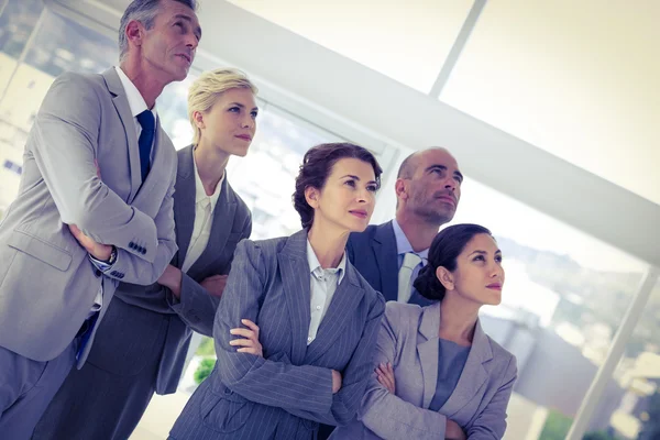 Business team looking up together — Stock Photo, Image