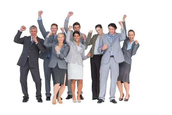 Excited business team cheering at camera — Stock Photo, Image