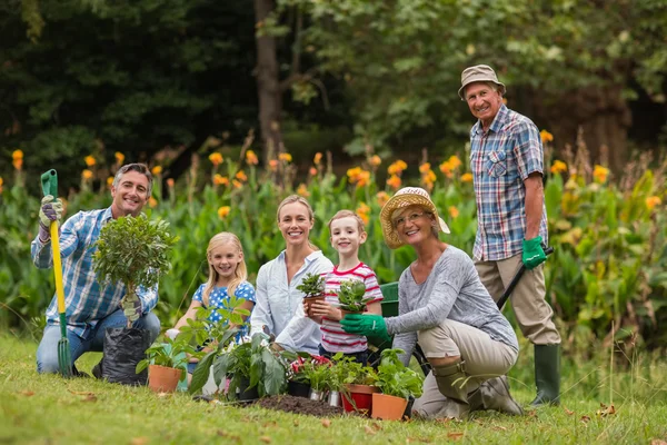 Happy family gardening — Stock Photo, Image