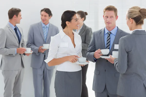 Business people drinking cup of coffee — Stock Photo, Image