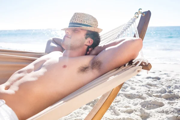 Handsome man resting in the hammock — Stock Photo, Image