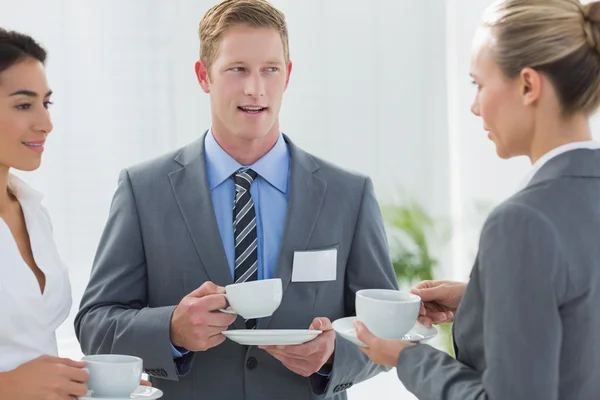 Business people drinking cup of coffee — Stock Photo, Image