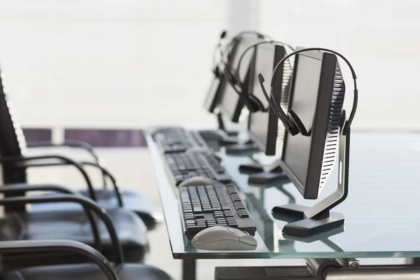 Computer with headsets — Stock Photo, Image
