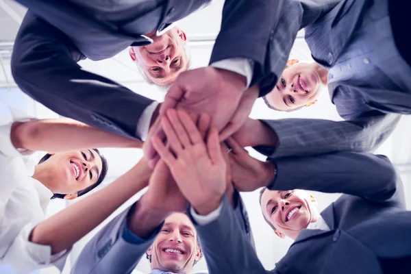 Business team standing hands together — Stock Photo, Image