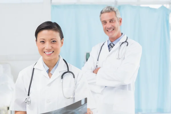 Confident male and female doctors — Stock Photo, Image