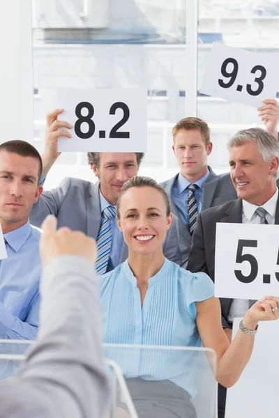 Business team giving mark after conference — Stock Photo, Image
