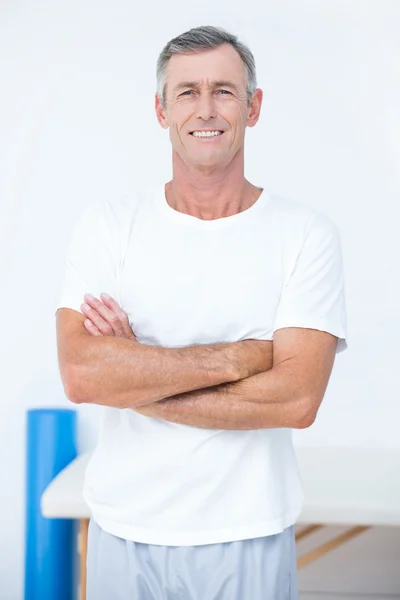 Patient looking at camera with arms crossed — Stock Photo, Image