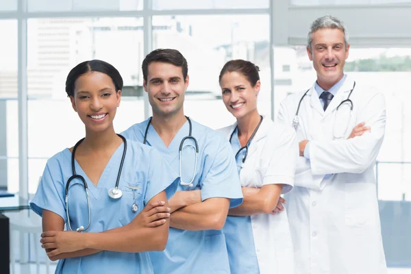 Portrait of confident doctors in row — Stock Photo, Image