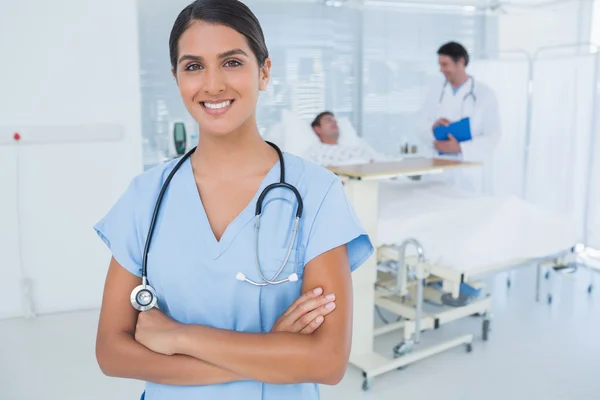 Smiling doctor looking at camera — Stock Photo, Image